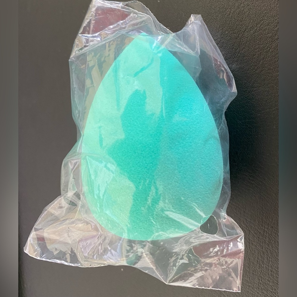 Teal beauty blender. Never Used